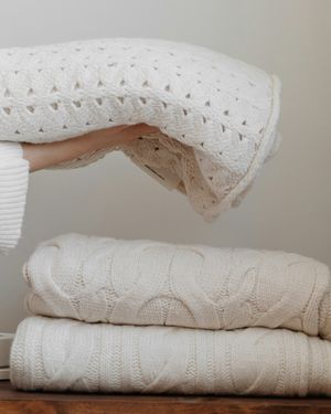 A stack of soft, freshly folded towels.